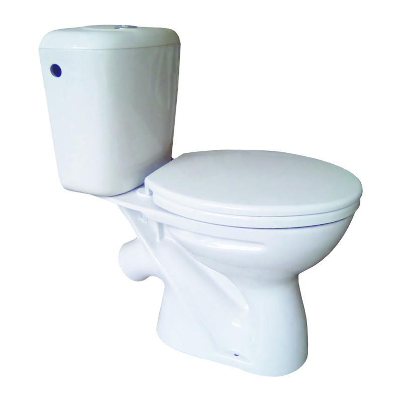 Унитаз-компакт Камелия эконом (c кнопочной арматурой.сиденье и болтами)